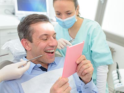 Suzanne Clift, DDS | Implant Restorations, Air Abrasion and Oral Cancer Screening